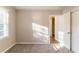 A comfortable bedroom with natural light and soft carpet at 1927 Cindy Dr, Decatur, GA 30032