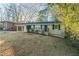 Charming single-story home with a covered carport and a well-maintained front yard at 1927 Cindy Dr, Decatur, GA 30032