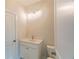 Bathroom featuring white cabinet and neutral wall paint at 5320 Memento Trace, Cumming, GA 30040