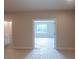 Spacious bedroom with neutral paint and a large window at 5320 Memento Trace, Cumming, GA 30040