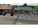 Commercial building featuring large window displays, ample parking, and prominent signage for Goodson Drugs at 5320 Memento Trace, Cumming, GA 30040