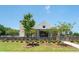 View of the exterior of the community clubhouse on a sunny day at 5320 Memento Trace, Cumming, GA 30040