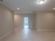 Living room featuring neutral paint and recessed lighting at 5320 Memento Trace, Cumming, GA 30040