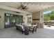 Community outdoor lounge with a charming fireplace, offering a comfortable gathering spot at 5320 Memento Trace, Cumming, GA 30040