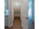 Storage space featuring hardwood floor and recessed lighting at 5320 Memento Trace, Cumming, GA 30040