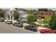 Town center view with restaurants, shops, and green spaces, featuring outdoor seating and a community gathering area at 5320 Memento Trace, Cumming, GA 30040