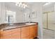 Bathroom with granite countertop and updated vanity at 534 Granville Ct, Atlanta, GA 30328