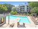 Inviting community pool with plenty of lounge chairs at 534 Granville Ct, Atlanta, GA 30328