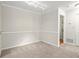 Neutral-toned dining room with access to bathroom at 534 Granville Ct, Atlanta, GA 30328