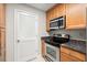 Well-equipped kitchen featuring stainless steel appliances and ample cabinet space at 534 Granville Ct, Atlanta, GA 30328