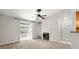 Living room features a fireplace and sliding door to balcony at 534 Granville Ct, Atlanta, GA 30328