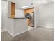 Open living room with neutral decor and carpeted floors at 534 Granville Ct, Atlanta, GA 30328