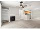 Bright and airy living room with a fireplace and built-in shelving at 534 Granville Ct, Atlanta, GA 30328