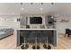 Basement bar with grey cabinets, white countertop, and brick backsplash at 1782 Patrick Rd, Dacula, GA 30019