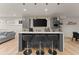Modern basement bar with gray cabinets and white countertop at 1782 Patrick Rd, Dacula, GA 30019