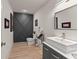 Modern basement bathroom with gray accents and stylish fixtures at 1782 Patrick Rd, Dacula, GA 30019