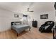 Spacious basement bedroom with light wood floors and ceiling fan at 1782 Patrick Rd, Dacula, GA 30019