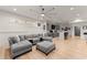 Open concept basement with sectional sofa and wet bar at 1782 Patrick Rd, Dacula, GA 30019