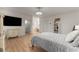 Cozy bedroom with a queen-size bed and built-in TV at 1782 Patrick Rd, Dacula, GA 30019