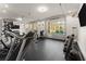 Well-equipped home gym with various exercise machines and weights at 1782 Patrick Rd, Dacula, GA 30019