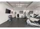 Basement gym with a variety of equipment and large mirrors at 1782 Patrick Rd, Dacula, GA 30019