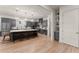 Modern kitchen with gray cabinets, a large island, and breakfast bar at 1782 Patrick Rd, Dacula, GA 30019
