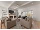Spacious living room with fireplace, hardwood floors and lots of natural light at 1782 Patrick Rd, Dacula, GA 30019