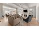Open concept living room with fireplace and hardwood floors at 1782 Patrick Rd, Dacula, GA 30019