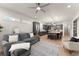 Spacious living area features a comfortable sectional sofa and hardwood floors at 1782 Patrick Rd, Dacula, GA 30019
