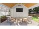 Relaxing patio area with seating and a large TV at 1782 Patrick Rd, Dacula, GA 30019
