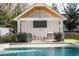 Outdoor entertainment area with a pool and a TV at 1782 Patrick Rd, Dacula, GA 30019