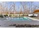Inviting swimming pool with spacious patio and lounge chairs at 1782 Patrick Rd, Dacula, GA 30019