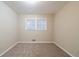 Cozy bedroom with neutral carpet and natural light at 3401 Tulip Dr, Decatur, GA 30032