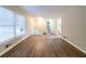 Bright living room featuring wood-look floors and large window at 3401 Tulip Dr, Decatur, GA 30032