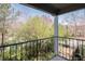 Private balcony overlooking a wooded area at 547 Granville Ct, Atlanta, GA 30328