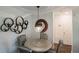 Bright dining area featuring a round table and decorative wall art at 547 Granville Ct, Atlanta, GA 30328