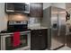 Kitchen features stainless steel appliances and granite countertops at 547 Granville Ct, Atlanta, GA 30328