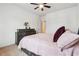 Bright bedroom with a queen-size bed and dresser at 5857 Silver Lake Dr, Mableton, GA 30126