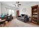 Bright home office features built-in shelving and a comfortable workspace at 5857 Silver Lake Dr, Mableton, GA 30126