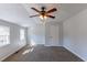 Bedroom with two windows and ceiling fan at 2022 Portsmouth Ct, Lawrenceville, GA 30044