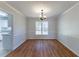 Formal dining room with hardwood floors and neutral wall colors at 2022 Portsmouth Ct, Lawrenceville, GA 30044