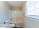 Full bathroom with a shower-tub combo and granite-look vanity at 128 Prity Ct, Mcdonough, GA 30253