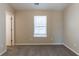 Bedroom featuring neutral colored walls, carpet, and a window at 128 Prity Ct, Mcdonough, GA 30253