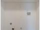 Laundry room featuring white walls and basic hookups at 128 Prity Ct, Mcdonough, GA 30253