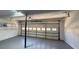 The garage is clean and has an automatic door at 5 Belmonte Sw Ct, Atlanta, GA 30311