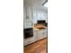 A modern kitchen featuring white cabinets and granite countertops at 5 Belmonte Sw Ct, Atlanta, GA 30311