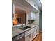 Kitchen featuring granite countertops, stainless steel appliances, and hardwood floors at 5 Belmonte Sw Ct, Atlanta, GA 30311