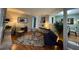 Inviting living room with hardwood floors, a stylish rug, and comfortable seating arrangements at 5 Belmonte Sw Ct, Atlanta, GA 30311