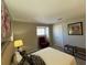 A spacious main bedroom with neutral colors at 5 Belmonte Sw Ct, Atlanta, GA 30311
