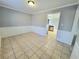 Bright dining room leading to kitchen at 985 James Ridge Dr, Lawrenceville, GA 30045